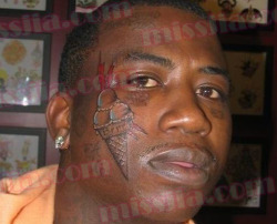 alcoholicgifts:  thedailywhat:  Face Tat of the Day: Don’t you just hate it when you pass out at a party and wake up with a permanent face tattoo of your silly catchphrase on an ice cream cone? Gucci Mane knows what I’m talking about. [gabedelahaye.]