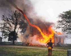 vondell-swain:vondell-swain:missyzu:Fire from a burning building being sucked into a tornado. wh get out of there fireman what are you doing there’s a tornado  I can’t stop laughing at this fireman he’s just standing there going “well darn, look