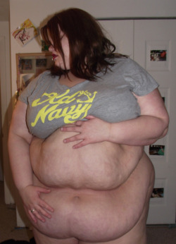 randomlancila:  bigbellybabes:  I promised myself that I’d take a picture for Tummy Tuesday, and well—here it is. I had another, more ‘flattering’ picture, that I was going to use, but then I said, y’know what? Fuck it. This is my belly, in