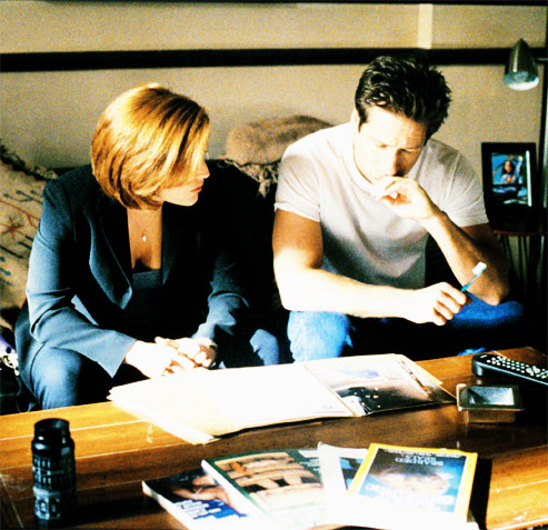 Hello Scully’s cleavage…is that an ashtray on the table?