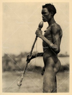 yagazieemezi:  This is an original 1930 photogravure of a Dinka man with a tribal smoking pipe in the Anglo-Egyptian Sudan (now Sudan), Africa. Photograph by Hugo Adolf Bernatzik 