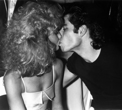 pepperfawn:   I got John Travolta to kiss Olivia Newton John at the Grease party back in 1978. Much better than having them just mug for my camera. Travolta lived in my building, but I never saw him.   AWWW FAVES 