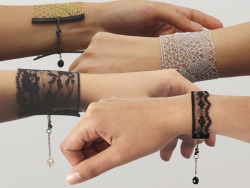 truebluemeandyou:  hollyloli:  craftjunkie:  Lace Bracelets {Inspiration} You could buy these…but you could also make them easily! :]  Just begging to be a DIY! Love these.    Found at: http://shop.lostateminor.com  New found summer craft activity *A*