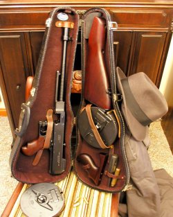 castironhorsehitcher:  jacknoir:  whyisjustinhere260:  spider8itch:  1928 Tommy Gun A Model of 1928 “Westy” and custom fitted violin case.  yes so much yes  hey dd get a load of this.  THIS IS MY DREAM.  
