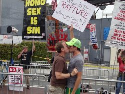 tapix:  pimpscone:  flynnriderthetimelord:  klairy-dust:  perfectionequalsoverrated:  My dad and step dad at LA Gay Pride with the protesters.  “where’s the rapture when you need it? I love them &lt;3 Reblog if you support gay rights  This is beautiful.&l