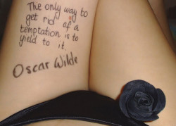 an entire quote written on her thigh :)