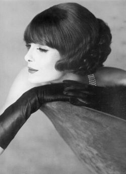 theniftyfifties:  Model Anne Saint-Marie wearing Lilly Dache, 1958.  Photo by Henry Clarke. 