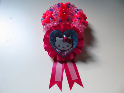 cellularstrawberry:  Attached Hello Kitty ribbon 