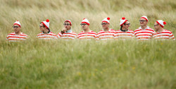 mabelmoments:  Sandwich, UK: Spectators in fancy dress  watch play on the course during the first day of the British open golf  championship at Royal St George’s. Photograph: Jon Super/AP 