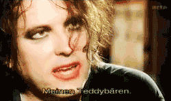 robertsmithsnipples:  weepingopenlyoversimonshair:  fuckyeahthecuregifs:  Ray Cokes: Your house is burning down, what three things would you rush in and save?. Robert Smith: My teddy beeaar.  This simply affirms the fact that he is cuddly  *SOBS* 