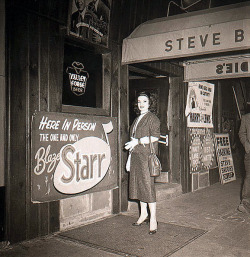 Blaze Starr poses at the entrance to &lsquo;Steve Brodie&rsquo;s Nightclub&rsquo;, in Philadelphia.. She enjoyed a 28-week appearance at this venue, in 1954..