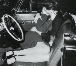  A couple making out at the Drive-In movie theater. Ohio, 1950s 