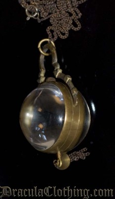 draculaclothing:  Steampunk Watch Pendulum  I have this one. Very pretty, too bad it broke after a couple weeks.