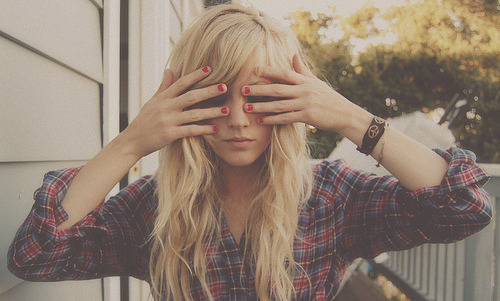 Blonde babe with red nails