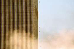 theholykaron:  youmightfindyourself:  On September 11, Richard Drew was also covering the Fall Fashion Week. He rushed to the site, where he captured the dramatic pictures of the people jumping out of the towers. In most American newspapers, his photos
