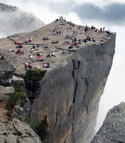 One of the most famous tourist attractions in Norway, this massive 604 meter (1982 feet) tall cliff in Forsand, Norway is known by any of these five names: Preikestolen, Prekestolen, Preacher’s Pulpit, Pulpit Rock or Hyvlatonnå. Those who make the