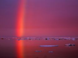 sav3mys0ul:   Arctic Rainbow Photograph by Paul Nicklen A rainbow is reflected in Arctic icy waters in Canada’s Foxe Basin. Data from submarines suggest that Arctic sea ice has thinned by 40 percent in the past 30 years. As more water is exposed, the