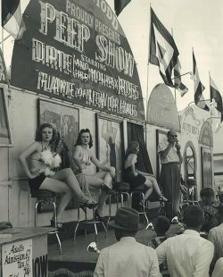 burleskateer:Showgirls relax on the Bally stage, while the “talker” makes his best pitch to fill the seats of this 50’s-era Carnival girlie-show, headlined by: Diane Ross and Her Monkey..