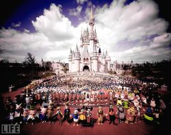 life:  Happy 40th, Walt Disney World. The entire Walt Disney World staff stands in front of Cinderella’s Castle prior to the grand opening of the amusement park. The largest and most visited amusement park in the world, Walt Disney World opened on Oct.