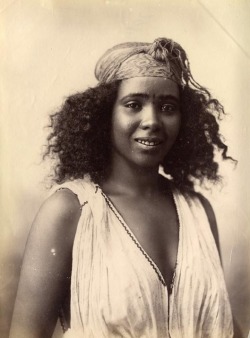 eponymousakil:  afro-textured-art:  nostalgerie:  Algerian Girl, 1870’s  Sad to say that I could not find the original source of this lovely photo, and I almost gave up before finding new information. I do not know enough about Algerian clothing in