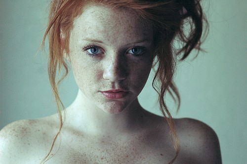 Young teen redhead with freckles