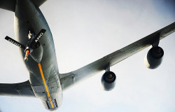 youlikeairplanestoo:  Getting gas is one of the most mindless parts of my day, not the case for this C-17 crew! A U.S. Air Force KC-135 Stratotanker aerial refueling aircraft from the 121st Air Refueling Wing out of Columbus, Ohio, prepares to refuel