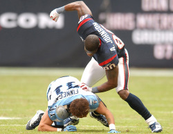 siphotos:  Texans WR Andre Johnson pummels Titans DB Cortland Finnegan during a Texans-Titans game last November. Houston will try to beat up on Baltimore on Sunday without Johnson, who is nursing an injured hamstring. The Titans are on a bye week. (John
