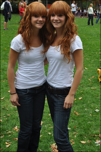 Young teen twin sisters