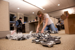 barackobama:   Ashleigh, a member of our field department, packages up cell phones to be sent out to staff in our Ohio offices. Fun fact: we also refer to our field department as 270, for reasons politics nerds will immediately appreciate (and the rest