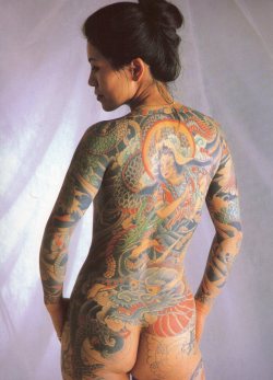 blackboybebop:  fugu-suicide:  Tattoo by Horicho I, scan from (roughly translated) Japanese tattooed ladies  Yeah I reblogged this like 3 times already… don't care.   