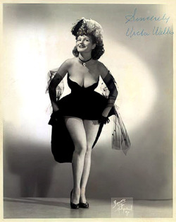 Autographed promo photo of:   Vicki Welles  aka. &ldquo;The Radiant Red-Haired A'Peeler&rdquo;..