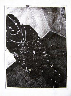 rawforms:  a work by Max Kuiper 2 pages (middle page) from a book (single copy) made in 1987 – by MK  Each page A5 (21 X 15 cm) Photocopied photograph \ paper  Photograph made in 1978.Body, black plastic, ropes, white painter’s tape, electrical cords,