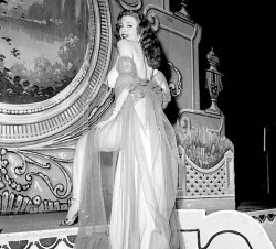 Tempest Storm decides to turn the other cheek.. A vintage 50&rsquo;s-era photo taken on the &lsquo;FOLLIES Theatre&rsquo; stage in Los Angeles, California..