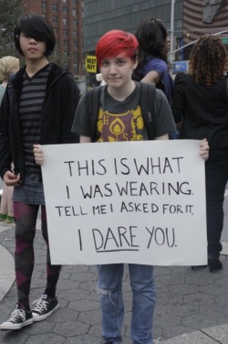 fuckyeahrainbowhair:  fallingfate:rapeculturemakesmeangry:  This is from the slut walk. One of the arguments is that girls ask for rape because they wear slutty clothes, short skirts, tight, low-cut tops. This girl is an example of the fact that rape