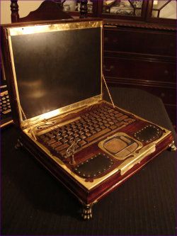 fadedhysteria:  lefabsie:  melancholyofmurry:  gladoslaughingalonewithscience:  skreamfilter:  f0rlack0fabetterurl:  marysbrain:  Datamancer’s     Steampunk Laptop This                               may look like a Victorian music box, but inside this