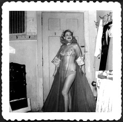 Trudy Wayne A candid backstage photo, taken in 1953 at a burlesque theatre in Minneapolis, Minnesota..