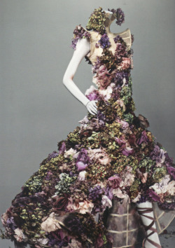 foudre:  Things rot….I used flowers because they die. My mood was darkly romantic at the time. - Alexander McQueen Nude silk dress embroidered with silk flowers and fresh flowers, from Sarabande, spring 2007 