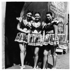 A candid photo from August of &lsquo;53, taken behind an unidentified Detroit burlesque theatre.. Featured here, (Left to Right) are chorus girls: Pat Marsh, June Albert (Line Captain), and Vivian..