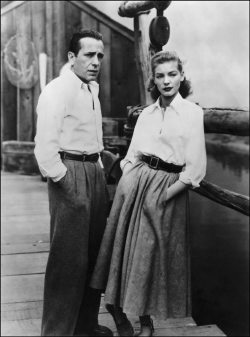 msmeganmcgurk:  RIP Lauren Bacall. Reblogging her fashion influence in classic cinema. msmeganmcgurk:  Classic Film Fashion #16: Lauren Bacall’s white button down in Key Largo (1948). Bacall’s Nora Temple wears a crisp shirt nearly identical to