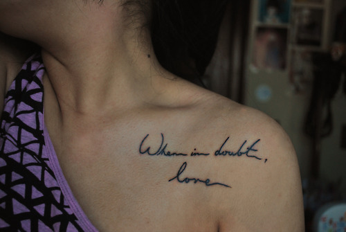Love conquers all tattoo