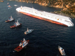 nationalpost:  Striking photos of tragedy in shallow waters as the Costa Concordia sinksThe Costa Concordia cruise ship ran aground off the west coast of Italy, at Giglio Island on Friday. Rescuers were painstakingly checking thousands of cabins on the