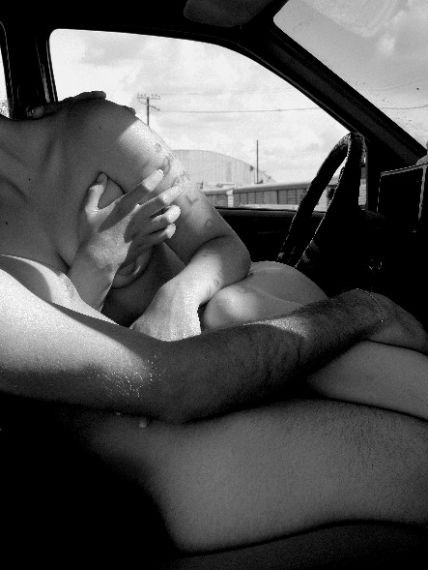 Couple having sex in car