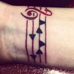 fuckyeahtattoos:  This is my second tattoo, Epona’s song from Zelda: Ocarina of Time. It’s on my right wrist. I intend to have a music themed sleeve on my right arm one day. I wanted a Zelda tattoo and when I decided on Epona’s song, I figured it