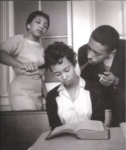 Eve ArnoldSchool for black civil rights activists; young girl being trained to not react to smoke blown in her faceVirginia, 1960 