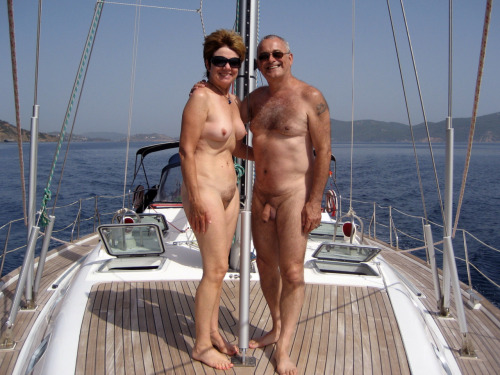 Nudist family sailing