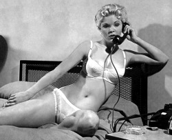 Candy Barr takes an important phonecall..