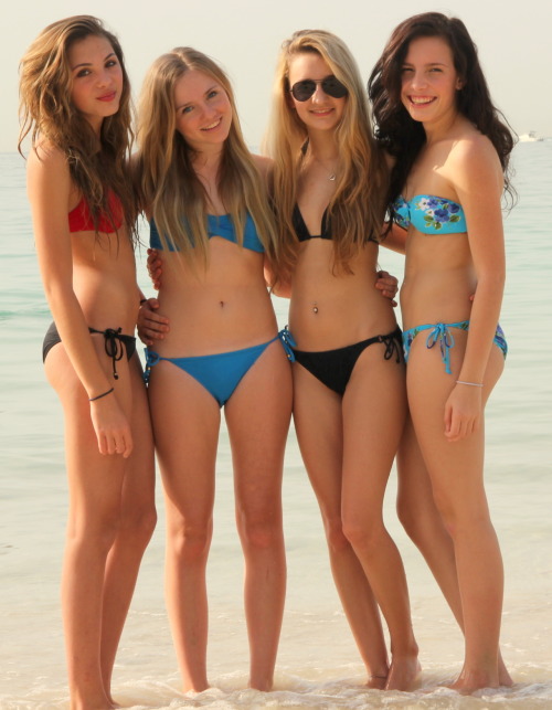 Cute teen girls on beach