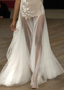 salas-llc:  designer wedding dress details of the “nude look” skirt for 2012  Love this.