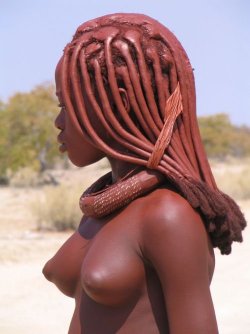 ratedmirr:  babybutta:  last-stop-lullabies:  shadsmeister:  bjay23:   The Himba wear little clothing, but the women are famous for covering themselves with otjize, a mixture of butter fat and ochre. The mixture gives their skins a reddish tinge. This