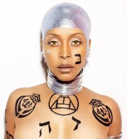  erykah badu speaking on the photo - &ldquo;The Painted Lady: My fav film maker is @alejodorowsky. He made a movie called The holy mountain in the 70s. 1 of his characters is called the painted lady&hellip;She wore all symbols and names of God on her